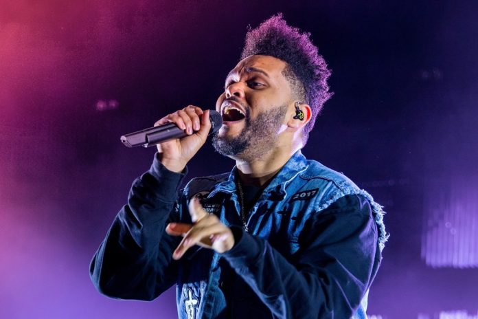 Guinness-Buch der Rekorde: The Weeknd weltweit populärster Musiker The Weeknd hat gleich zwei Weltrekorde aufgestellt. / Source: Christian Bertrand/Shutterstock.com